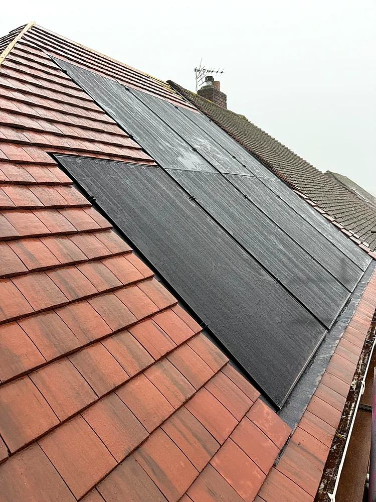 Roof-mounted solar PV panel installation, Newport